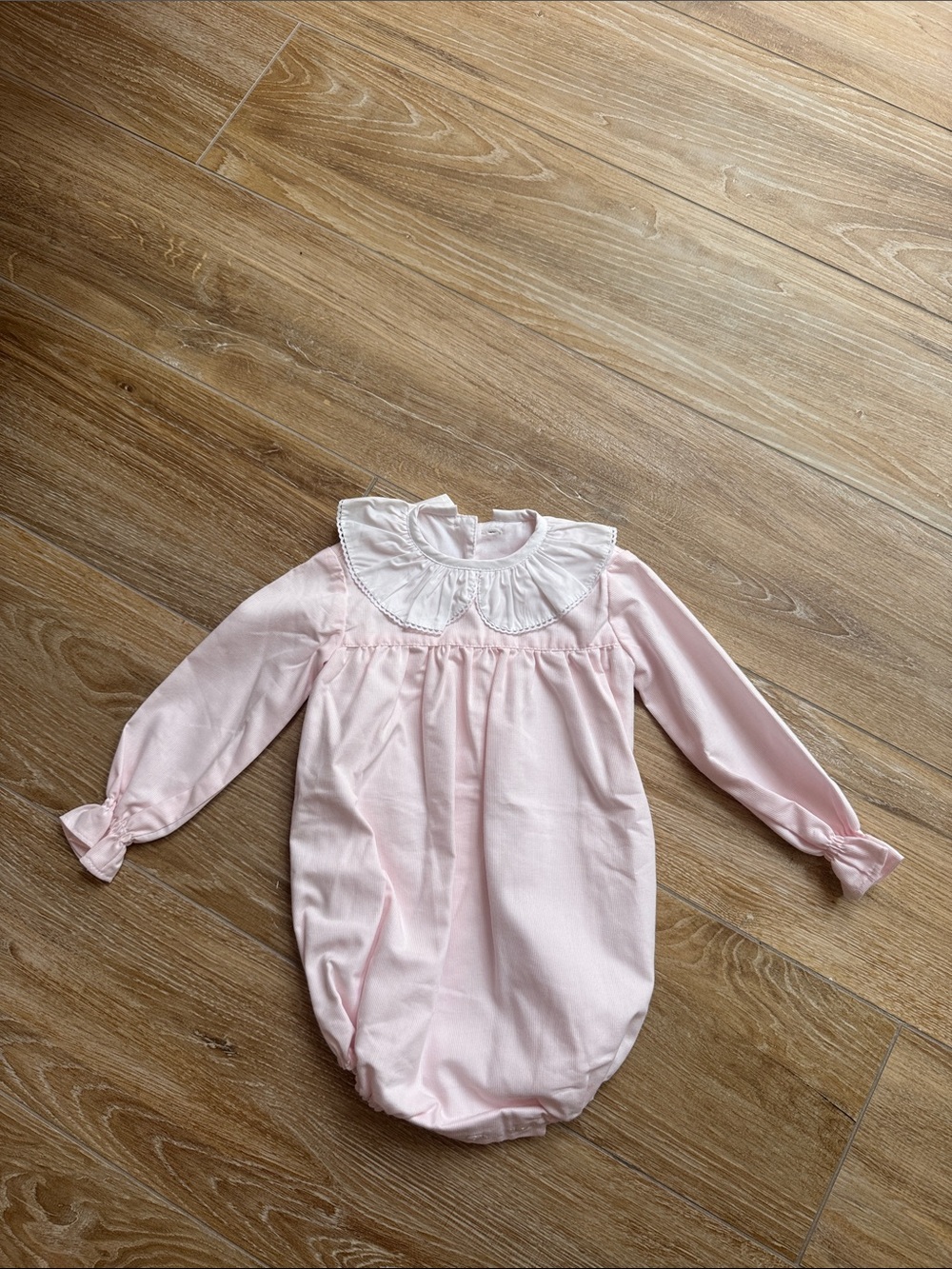 Pukatuka Light Pink Baby Romper with White Trim